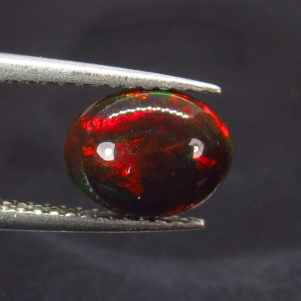 0.95 Ct Natural Ethiopian Black Fire Opal Oval Cab (1 of 2)