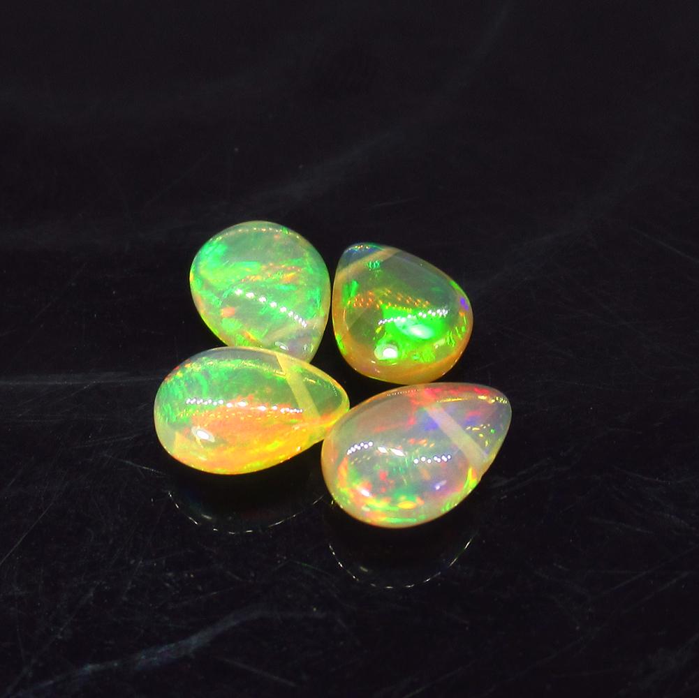 2.66 Ct Natural 4 Drilled Multi-Color Fire Pear Opal (1 of 2)