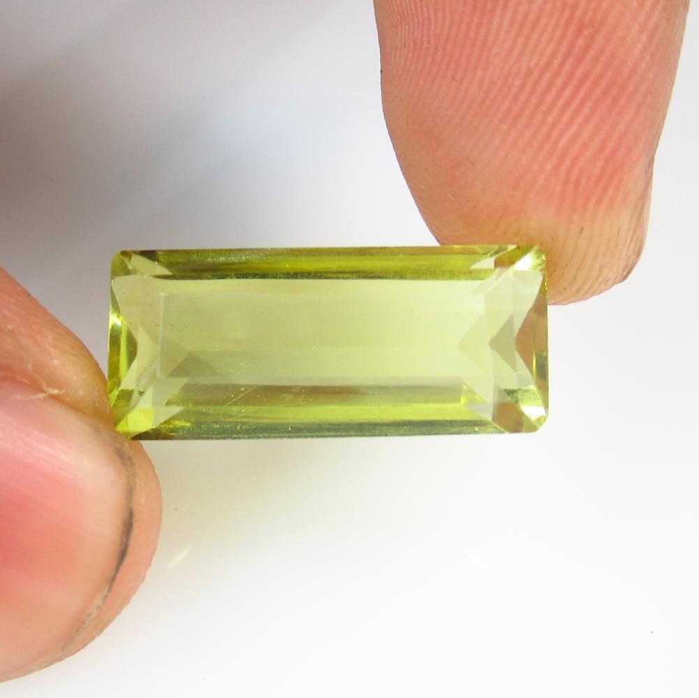 11.73 Ct Natural Lemon Quartz Octagon Cut: No Reserve! Title: 11.73 Ct Natural Lemon Quartz Octagon Cut Stone Clarity: VVS Gemstones: Natural Lemon Quartz Carat Weights: 11.73 Size/Dimensions: 20.30 x 8.90 x 7.50 mm Additional Information: Goo