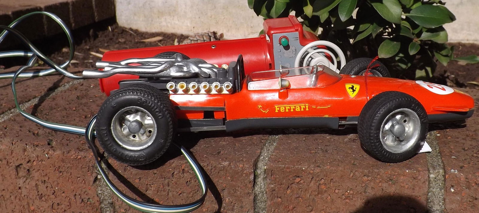 Schuco 5312 Ferrari Formula 1 car, windup, rack and (1 of 4)