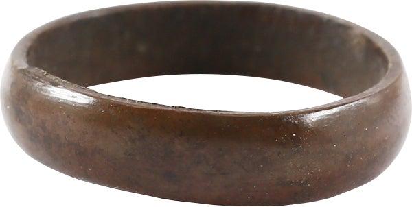 RARE COPPER VIKING RING, 900-1050 AD, SZ 4 ¼: Size 4 1/4. 3.5mm width with a well-rounded face. Mottled red/brown patina with encrustation from burial. Vikings were expert metallurgists. The use of pure copper is rare and suggests a supernatural 