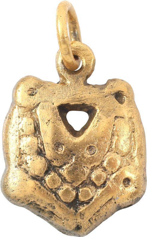 FINE VIKING HEART PENDANT C.950-1050 AD: 3/4” height, intricately detailed. Heart-shaped field with a beaded border surrounding a pierced heart. The broad rounded edges with nubs at the sixth points. Made by the open face mold technique. F