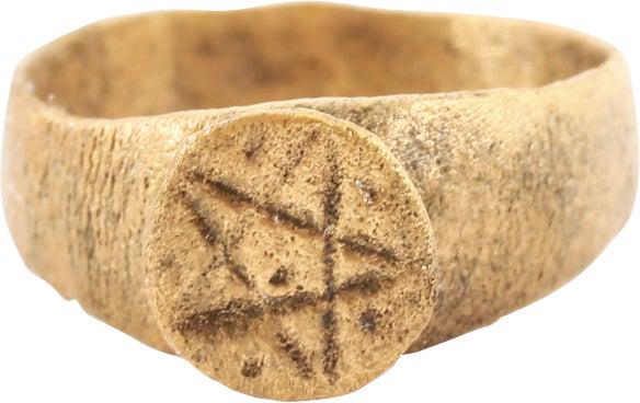 MEDIEVAL SORCERESS’ RING 8TH-11TH CENT, S 4 ¼: Size 4 1/4 with 4.1mm rounded face band flaring to the shoulders. Raised circular conical bezel resembling a stone, cut with a pentagram that evolved from ancient Greek mythology. Sorcery evolved from