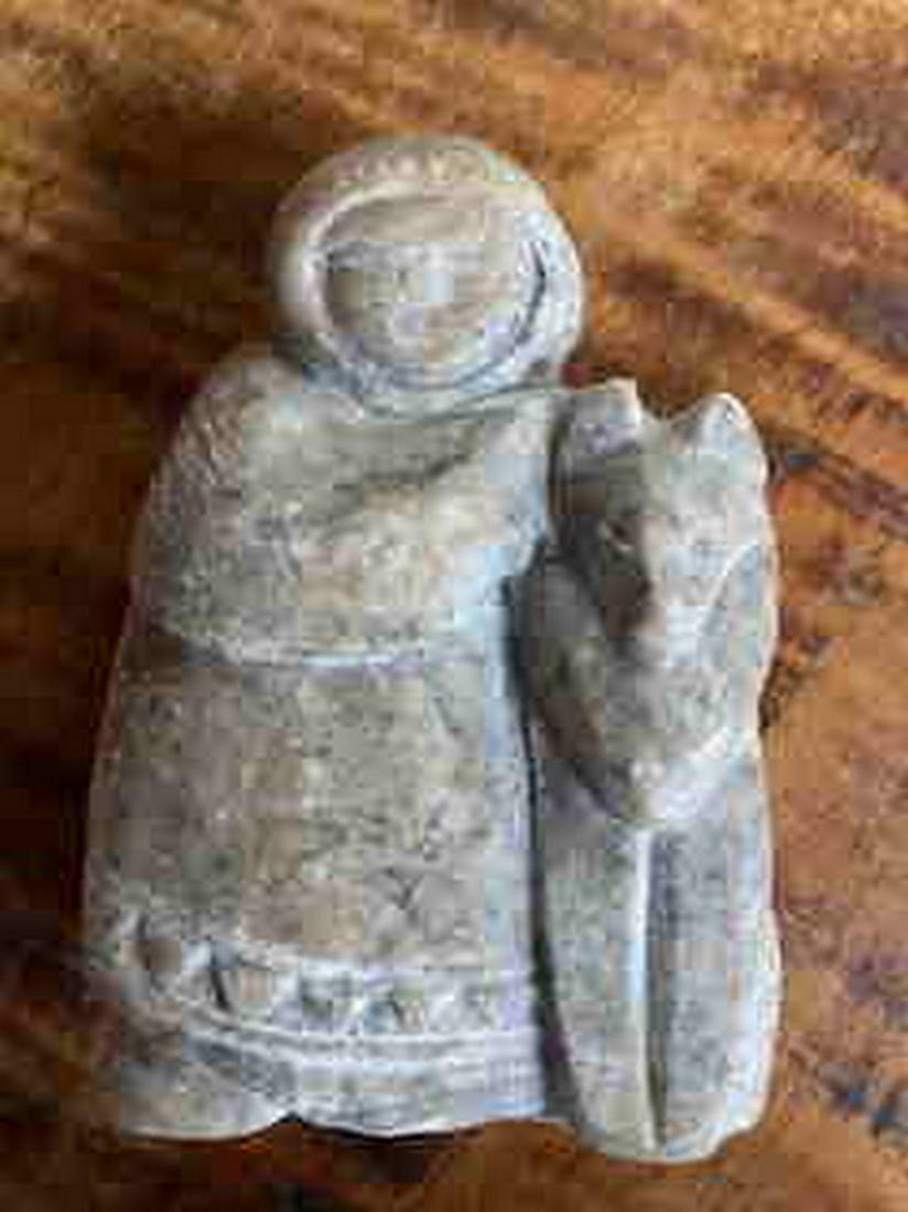 Inuit sculpture: Title: Inuit sculpture Dimension: Measures approximately 3 inches tall by 2 inches wide. Additional Information: Wonderful carved Inuit Child and Dog carving. Charming probably first quarter 20thC Inu