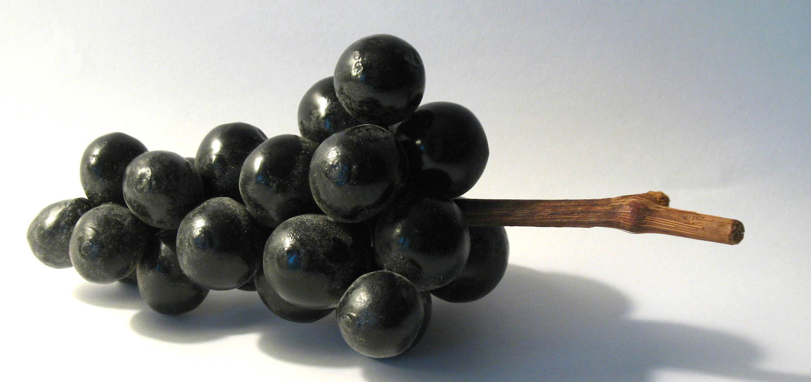 Vintage Cluster Of Black Stone Grapes. (1 of 1)