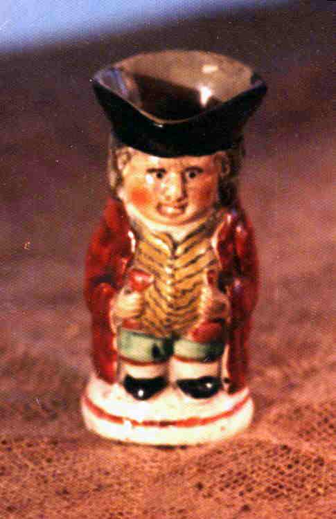A scarce small well painted early staffordshire toby (1 of 1)