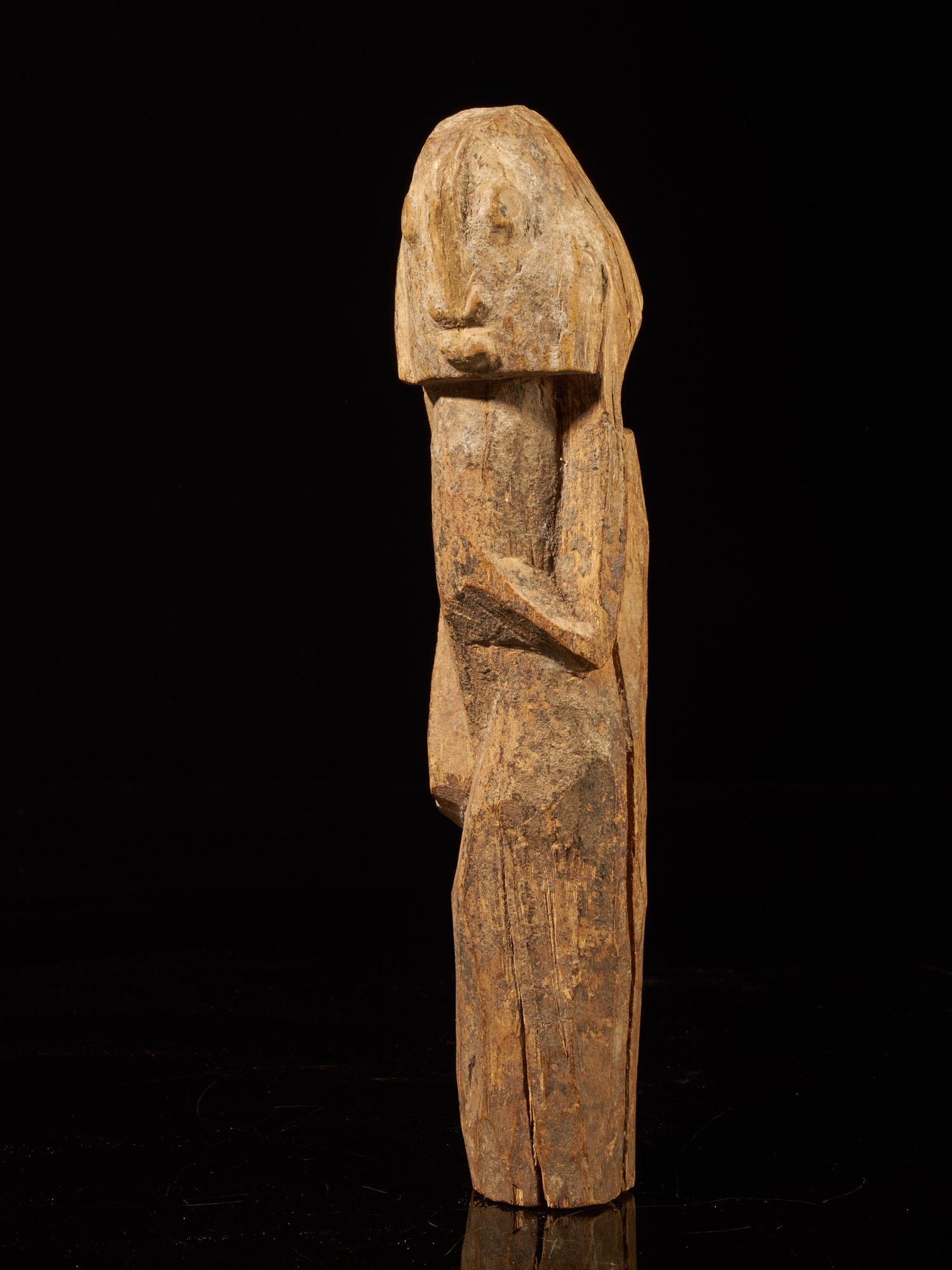 Wooden Figure, Dogon people, Mali: Title: Wooden Figure, Dogon people, Mali Maker: coll.Klaus Paysan Origin: Mali Dimension: 29.5 x 7.5 x 7.5 Material: Wood Additional Informatioon: A simplistic wooden figure created by the Dogon peopl
