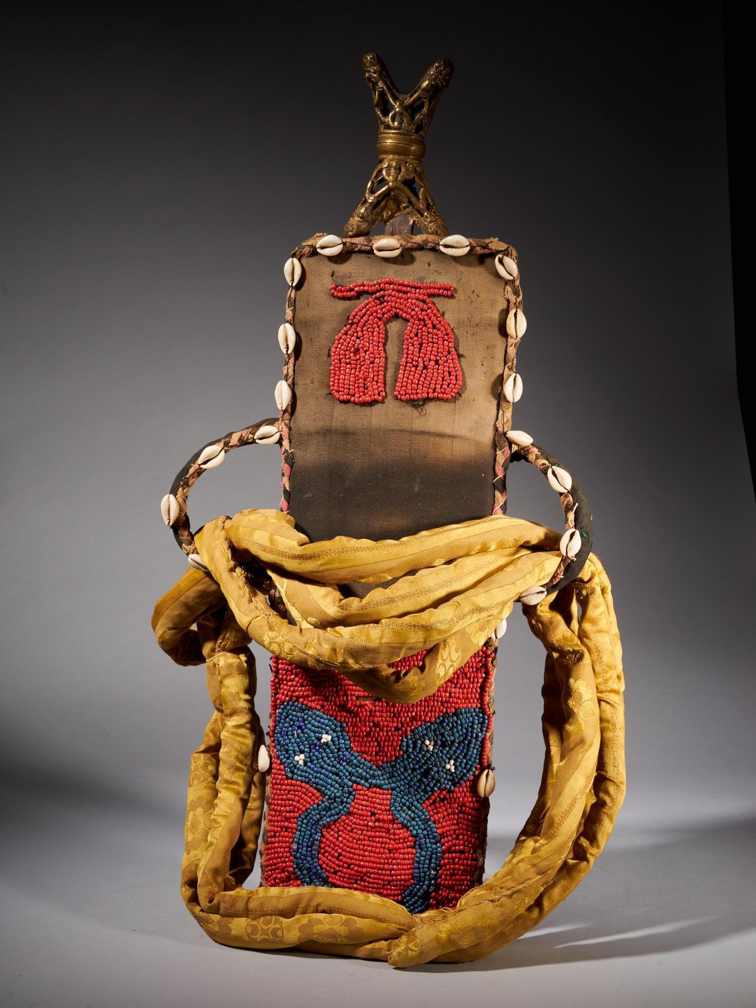Grassland people, Ornamental Prestige Sword in Scabbard: Title: Grassland people, Ornamental Prestige Sword in Scabbard Additional Info: This Cameroon sword has an old iron blade in typical form (widening at the top) and is decorated with vertical grooves. 