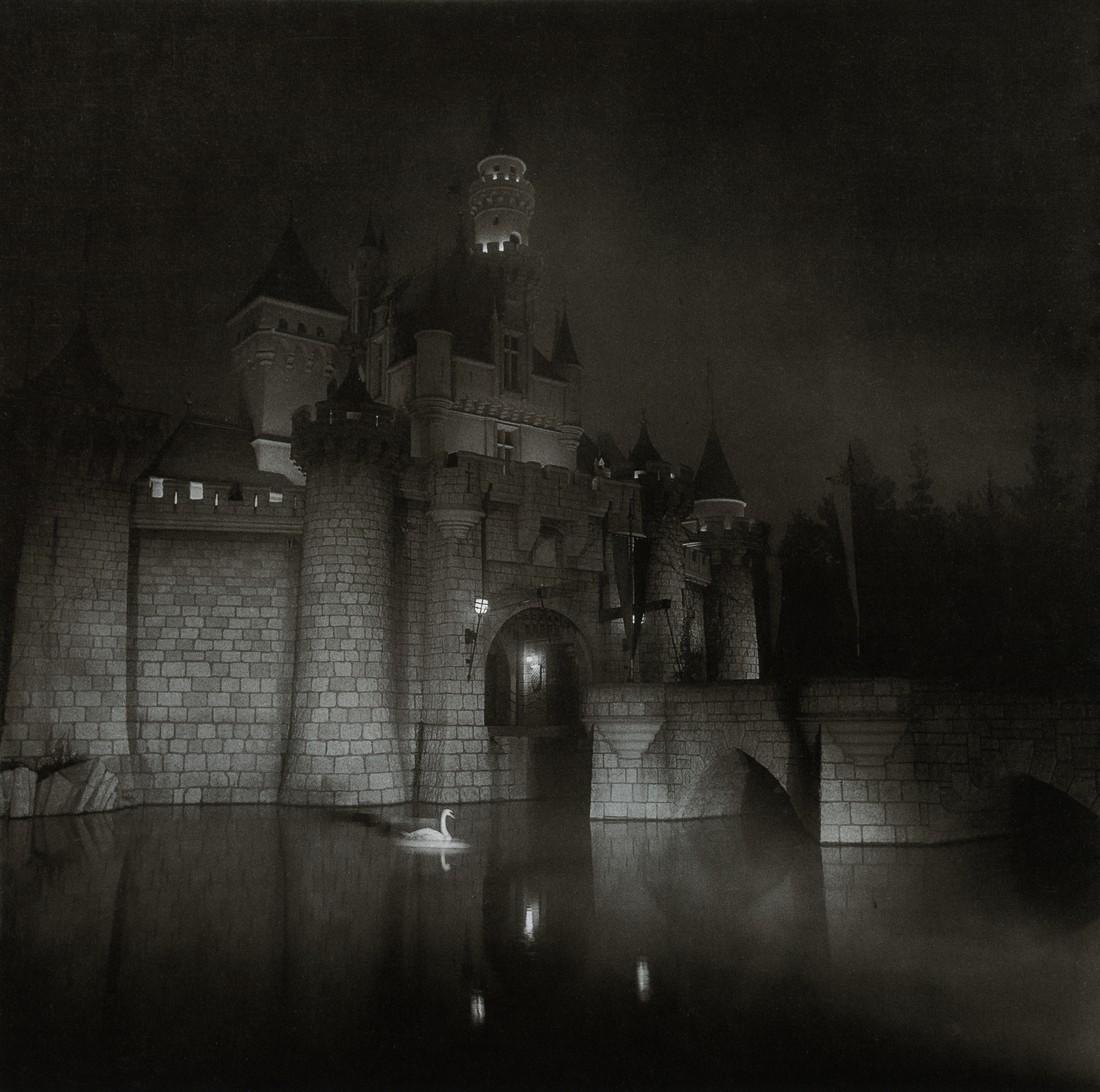 DIANE ARBUS - A Castle in Disneyland, CA, 1962: Artist: DIANE ARBUS Title: A Castle in Disneyland, CA, 1962 Medium: Photo Litho, 1972, USA Dimensions: 8.25x8.25" Description: Heat Wax Mounted on 11x14" Conservation Board Artist Bio: Diane Arbus was