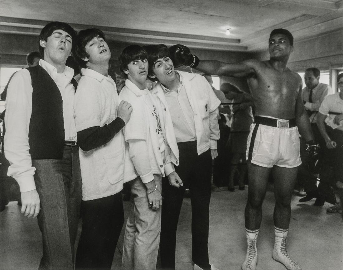 HARRY BENSON - Ali Hits George, 5th Street Gym, Miami: Artist: HARRY BENSON Title: Ali Hits George, 5th Street Gym, Miami 1964 Medium: Photo Litho, 2008, USA Dimensions: 9.5x7.5" Description: Heat Wax Mounted on 11x14" Conservation Board Artist Bio: Reser