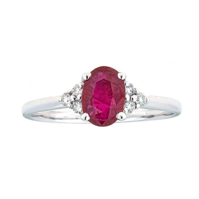 10K WHITE GOLD RUBY & DIAMOND RING: Title: 10K WHITE GOLD RUBY & DIAMOND RING Metal Purity: 10k White Gold Metal Weight: 1.87 Gemstones: Ruby Carat Weights: 0.88 Size/Dimensions: 5X7 Shape: Oval Diamond Clarity: I1-I2 Diamond Weight: 0.