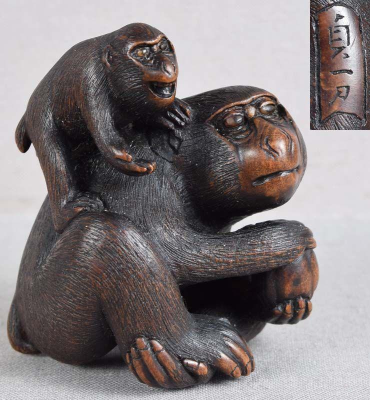 19c netsuke MONKEY with young SADAKAZU ex Royal: Excellent 19th century okimono sized boxwood netsuke of a mother monkey holding a persimmon in her hands while the young sitting on her shoulder begs for the fruit. Extraordinary quality carving down 