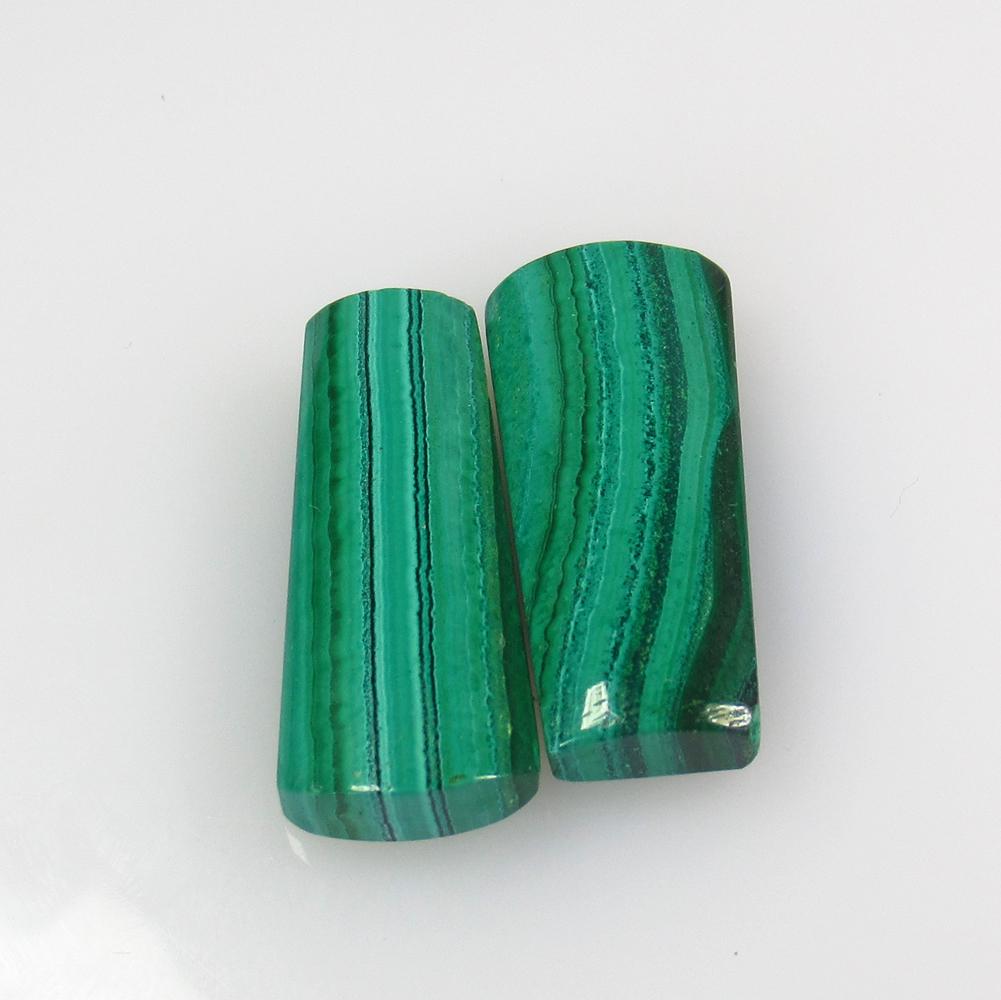 40.25 Ctw Natural Green Malachite Fancy Pair: No Reserve! Title: 40.25 Ctw Natural Green Malachite Fancy Pair Stone Clarity: Opaque Gemstones: Malachite Size/Dimensions: 40.25 Carat Weights: 22.50 x 10.30 x 5.70 mm / 3 PC's Additional Information