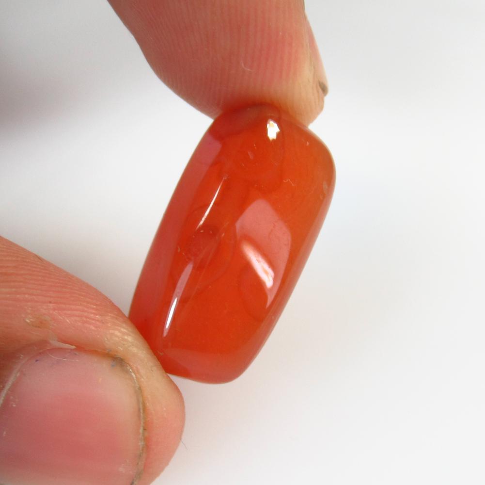 23.45 Ctw Natural Drilled Carnelian Rectangular Cab: No Reserve! Title: 23.45 Ctw Natural Drilled Carnelian Rectangular Cab Stone Clarity: Semi-Transparent Gemstones: Carnelian Size/Dimensions: 23.45 Carat Weights: 21.00 x 11.00 x 10.40 mm Additional In
