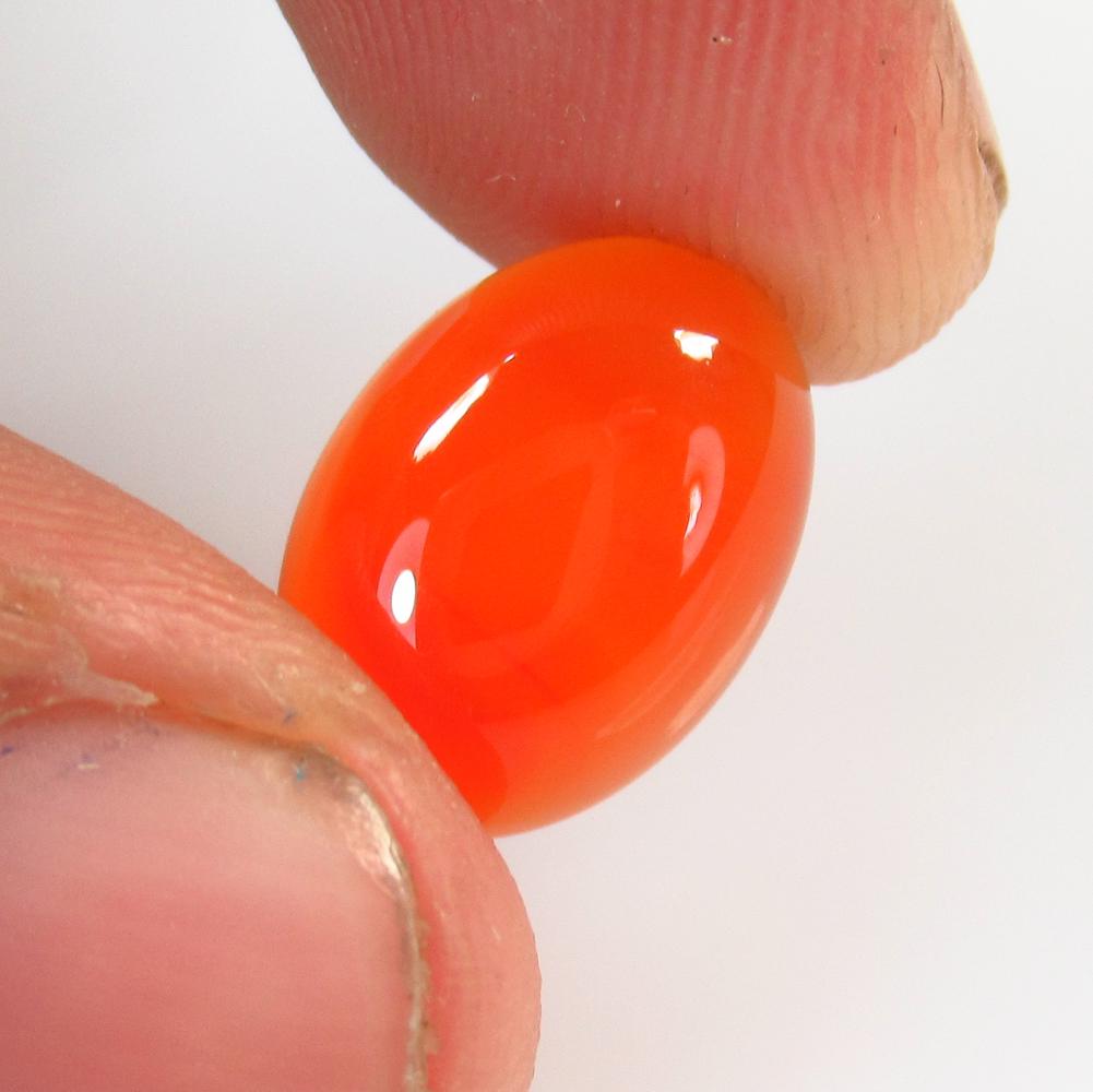 4.56 Ctw Natural Orange Carnelian Oval Cab: No Reserve! Title: 4.56 Ctw Natural Orange Carnelian Oval Cab Stone Clarity: Semi-Transparent Gemstones: Carnelian Size/Dimensions: 4.56 Carat Weights: 13.80 x 9.90 x 4.60 mm Additional Information: E