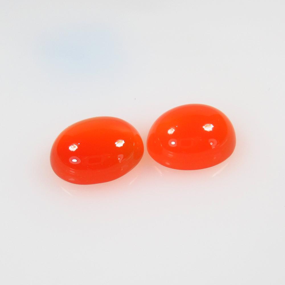9.54 Ctw Natural Orange Carnelian Oval Pair: No Reserve! Title: 9.54 Ctw Natural Orange Carnelian Oval Pair Stone Clarity: Semi-Transparent Gemstones: Carnelian Size/Dimensions: 9.54 Carat Weights: 12.20 x 10.20 x 5.10 mm / 2 Pc's Additional Inf