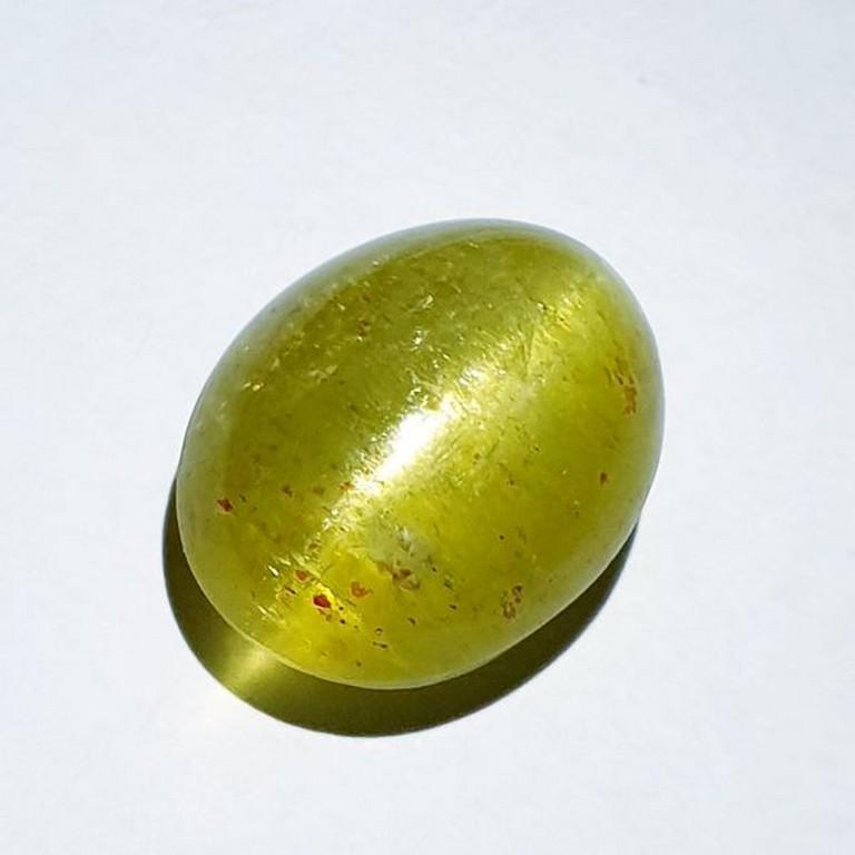 21.26 ct Natural Apatite cat's Eye: No Reserve! Title: 21.26 ct Natural Apatite cat's Eye Color/Clarity: Semi Transparent Carat Weight: 21.26 Dimensions: 18.10 x 13.80 x 10.40 Additional Information: Oval - Africa Shipping: Domestic: