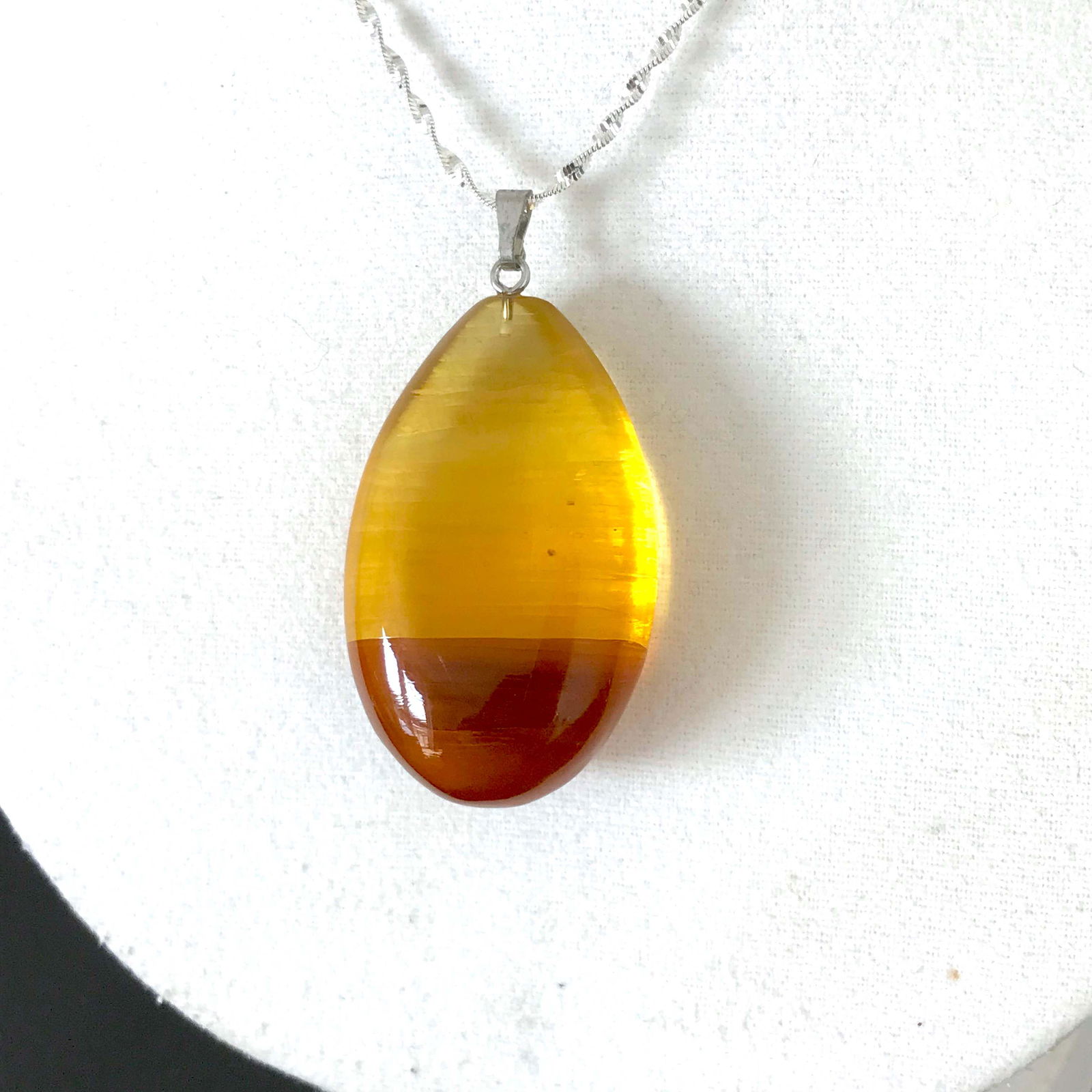 Unique and Marvellous Amber Pendant shaped like a Drop (1 of 8)