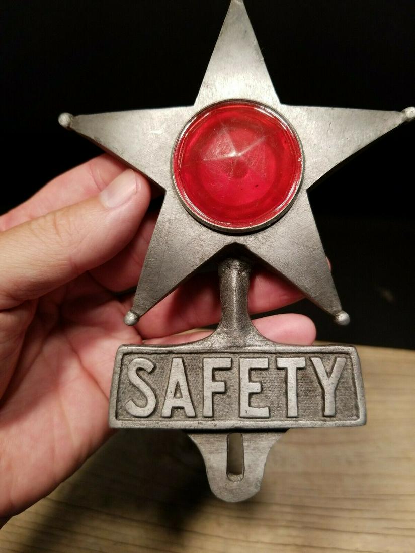Aluminum Safety Star Car License Plate Fob Topper: 6 1/2" tall x 4 1/2" wide Wonderful reproduction safety license plate topper. Good detail aluminum, slightly aged to look like an antique. Certainly hard to tell its age. Reserve: $20.00 Shipping: Dom