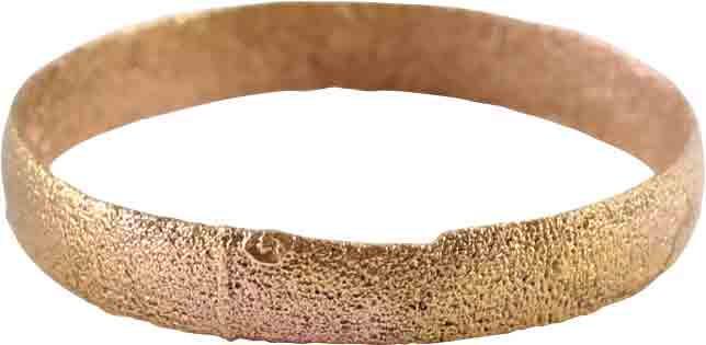 ANCIENT VIKING WEDDING RING C.850-1050 AD SIZE 5 ¼: Rounded band size 5 ¼, 2.7mm. Surface lightly textured from burial. Professionally refurbished with the surface restored in 24karat gold. Fine example. Gift boxed with certificate of authenticity. Re
