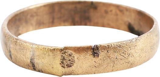 VIKING WOMAN’S WEDDING RING C.1000 AD, SZ 6 ¾: Late 9th-early 11th century AD. 3.5mm width with low rounded face. Sized for the small finger as was the custom. The very light texture from burial. Vikings exchanged rings on the pommel of the groom�