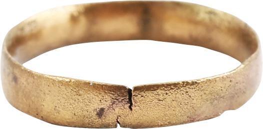 ANCIENT VIKING WEDDING RING C.1000 AD JEWELRY, SIZE 4 ¾: Late 9th-early 11th century AD. Gilt bronze, size 4 ¾ for the small finger as was the custom. 3.1mm band with a low rounded face. Surface textured from burial. Professionally refurbished with the 24k