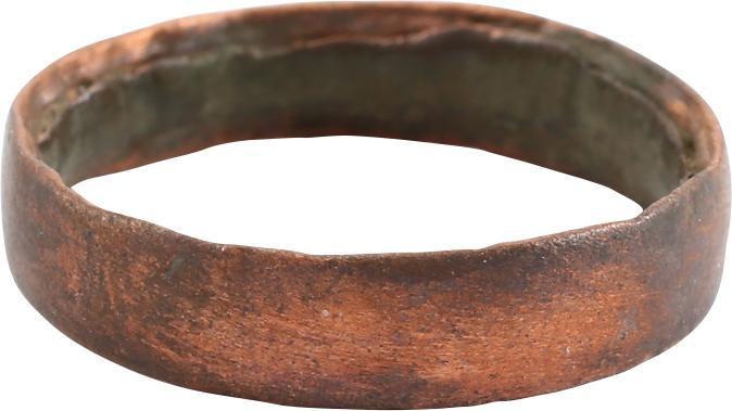 DOUBLY RARE COPPER VIKING RING, 900-1050 AD, SIZE 11 ¼: Size 11 1/4. 5.3mm width with rounded face. Made with a central core to distribute the molten metal and heat. The core was then laboriously removed by hand with the remnants still visible. Fine rich r