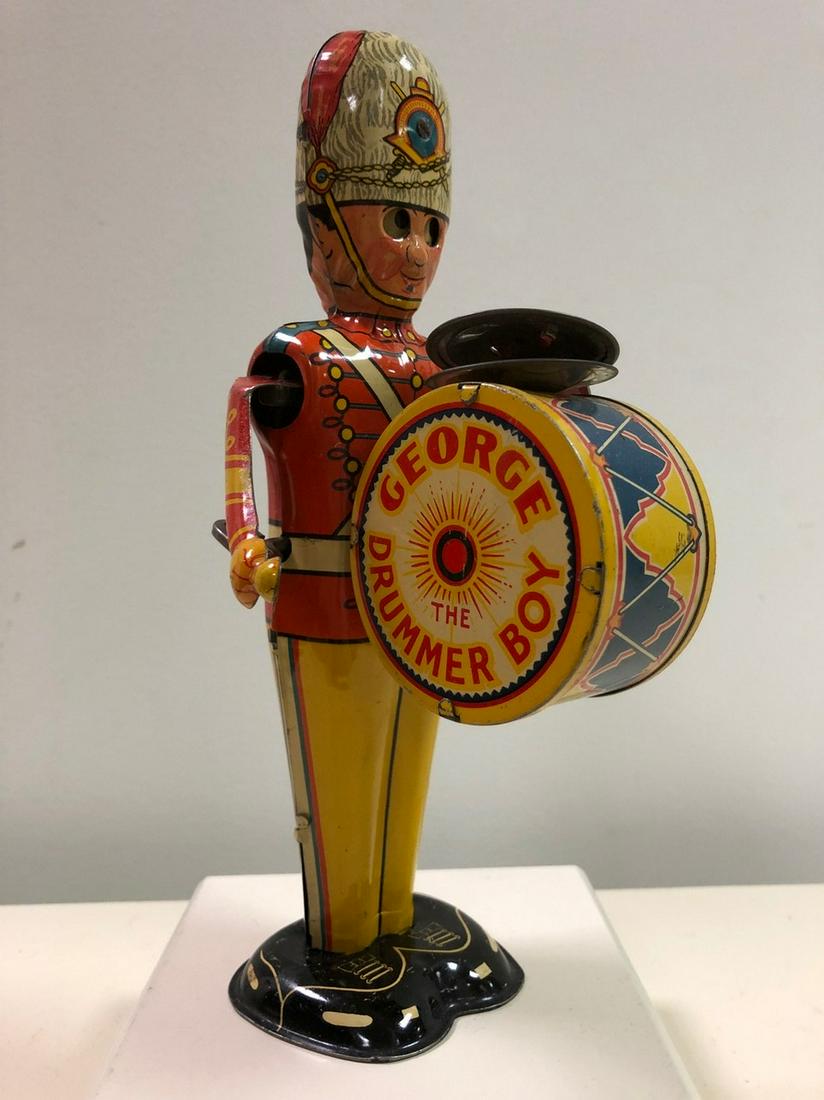 “George The Drummer” By Marx - Tin Windup: “George The Dummer” by Marx - Tin windup. Plays cymbals and drum. Circa -1930. Item works well. Shipping: Domestic: Flat-rate of $30.00 to anywhere within the contiguous U.S. International