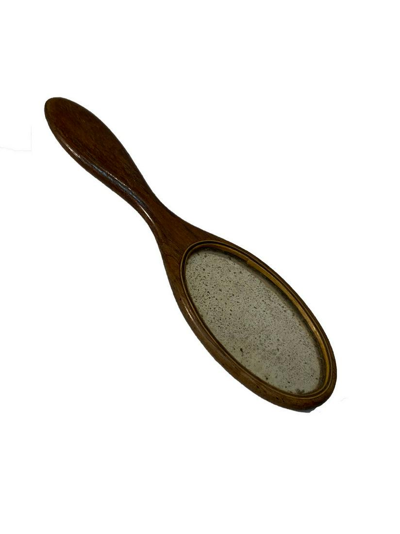 Mini Mirror: Title: Mini Mirror Dimension: 4 ¾ “ Provenance: A mini Shaker hand mirror. The mirror is oval shaped and the handle and frame is carved from walnut. Shipping: Domestic: Flat-rate of $15.00 