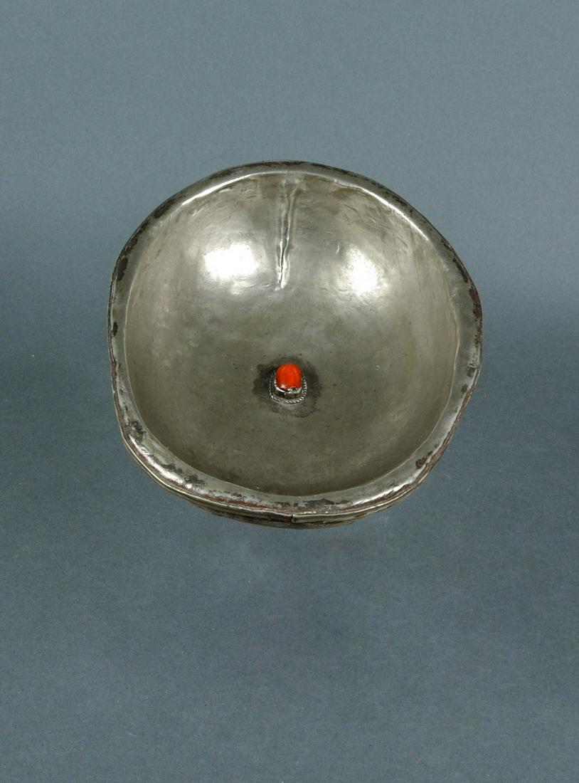 Tibet Kapala Skull Cup: Title: Tibet Kapala Skull Cup Date/Period: E. 20h c. Size: 7"long Description: The kapala itself is a symbol of wisdom (prajna) and knowledge. In the inner-level or subtle-body practices of Buddhist T