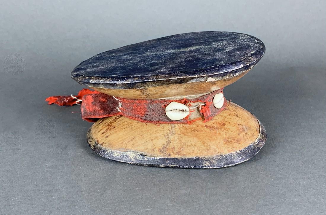 Tibet Skull Damaru: Title: Tibet Skull Damaru Date/Period: 20th c. Size: 5 1/2"x 3"H Description: Tribal human skulls....Tibetan damaru. This antique drum is made from two human skulls, one male and one female, and cover