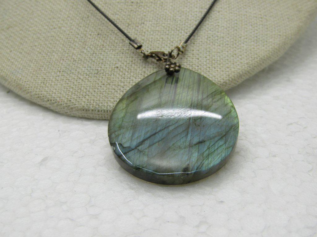Sterling Labradorite Pear-Shaped Pendant Necklace, 18": Sterling Labradorite Pear-Shaped Pendant Necklace, 18" Black Filament Collar. The Clasp and clamps are marked .925 and test as sterling. The bail has a floral design on the front. The pendant is 2" lo