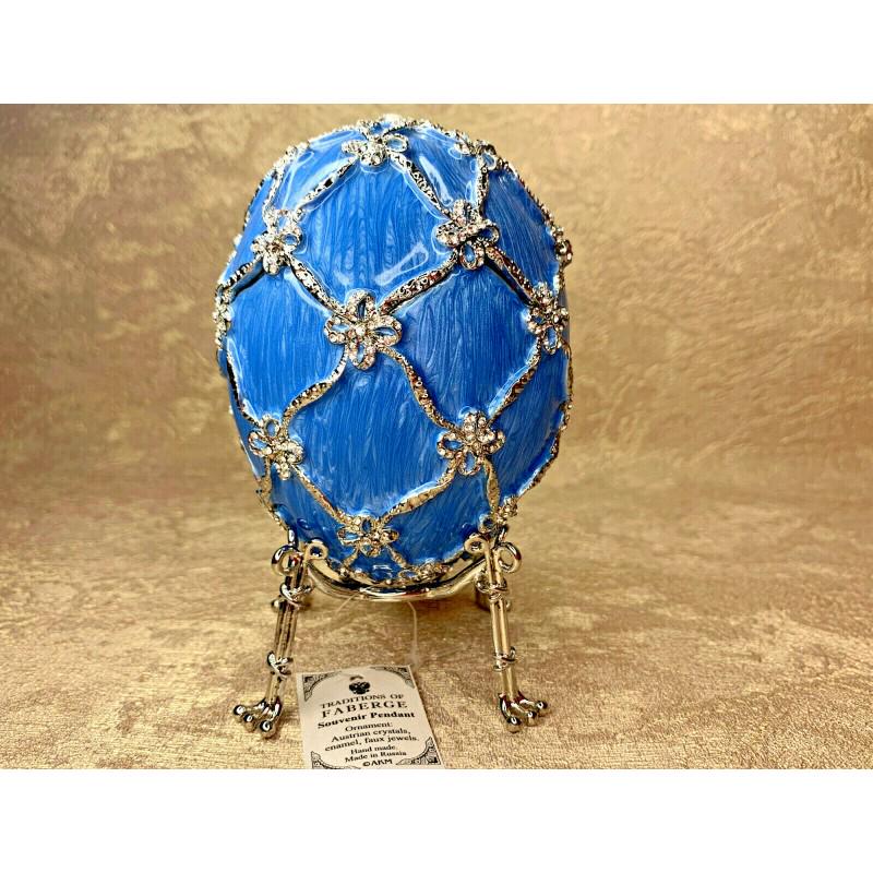 Decorative Faberge luxurious egg Musical Swan jewelry: DESCRIPTION: The egg as a gift to the mother of Nicholas II is distinguished by soft tenderness and exquisite beauty. Made in deep blue color. Transformed with silvery cords intertwined with intricate