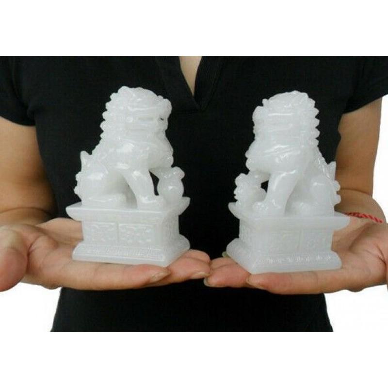 China Fengshui Natural White Jade Hand Carved Statues: DESCRIPTION: White Jade Natural Foo Dogs Statuette China MATERIAL: Jade CONDITION: New. DIMENSIONS: 110x70 mm (4,33x2,75 inch) Please buy AS IS. Item not tested. Ref.: 6767544 Reserve: $80.00 Shipping