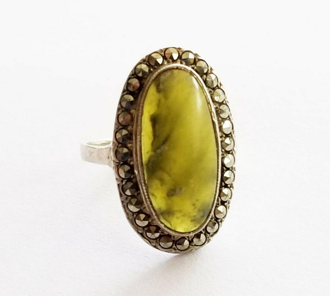 1970 Irish Silver Ring Sz 8.25 Moss Agate 30 Marcasite: Up for sale from a recent client in Honolulu Hawaii, this 1970 Irish Sterling silver ring in a size 8.25 that is bezel set with 1x green moss agate oval cabochon (19mm x 8.5mm) and is further surround