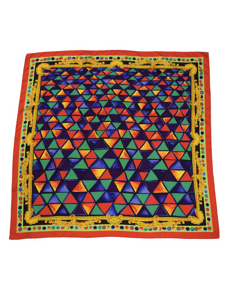 Versace Jewel Tone Silk Scarf: Title: Versace Jewel Tone Silk Scarf Additional Information: Triangular patterned jewel tone silk scarf by Versace circa1980's. The green, blue, orange and red triangles scale from small to large from