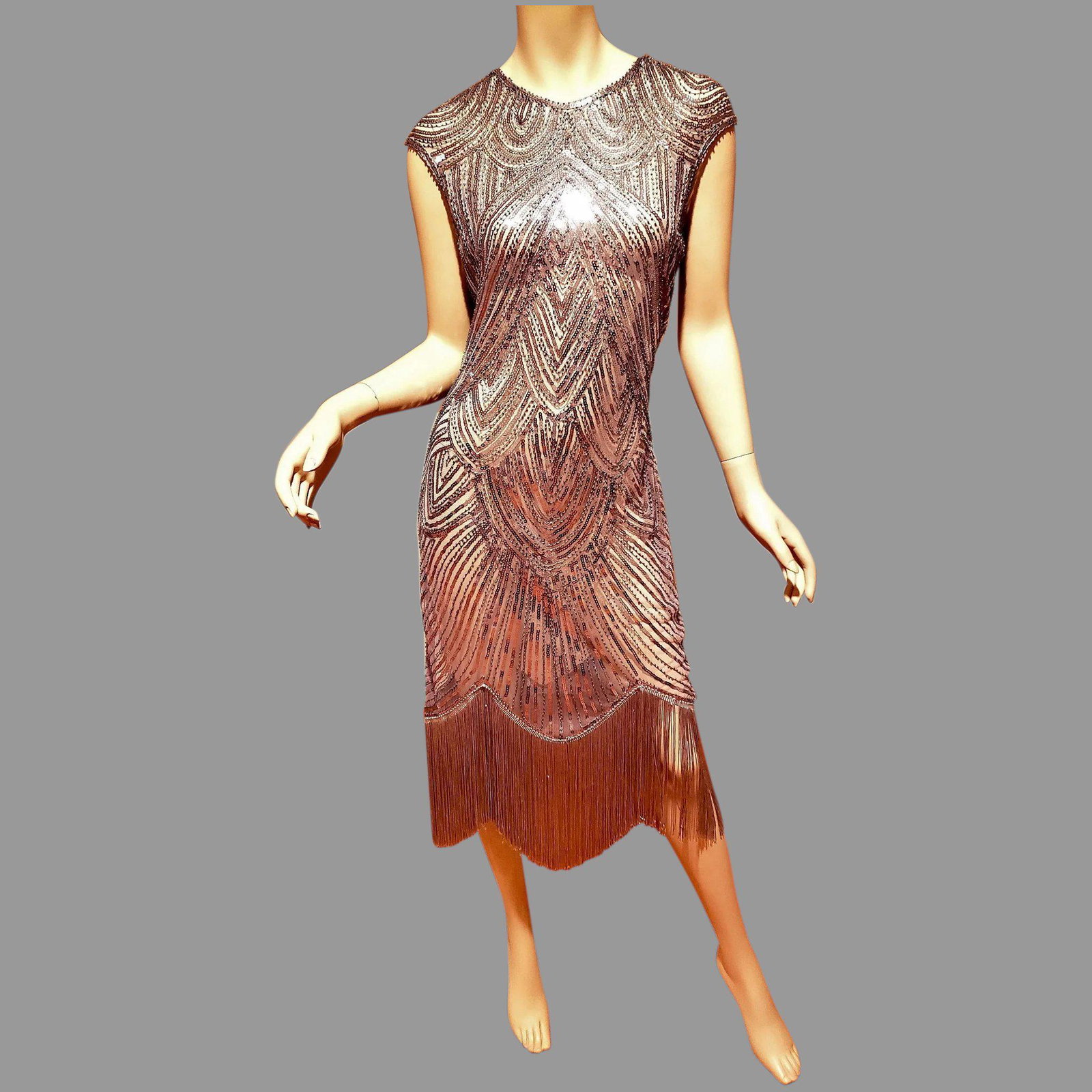 Vtg Silver Layering Embellished Flapper fringed dress: Stunning Flapper fringed dress Circa 1960's fully Sequined and beaded in a Stunning Art Deco design Long Fringes in a Silvery Grey coloration. Absolutely magnificent Embellished on Net. Bust-36" Waist