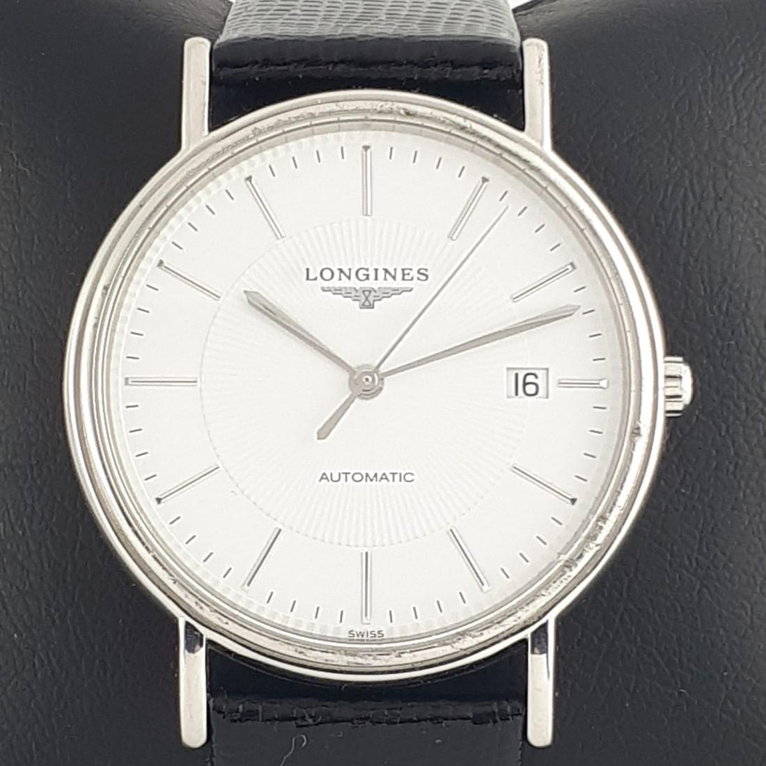 Longines - Presence - Ref: L4.921.4 - Men -: Model: Presencee Reference Number: Ref: L4.921.4 Gender: Men Period: 2011-present Movement: Automatic Case material: Steel Type: Analogue wristwatch Shipped Insured: Yes Condition: In working co