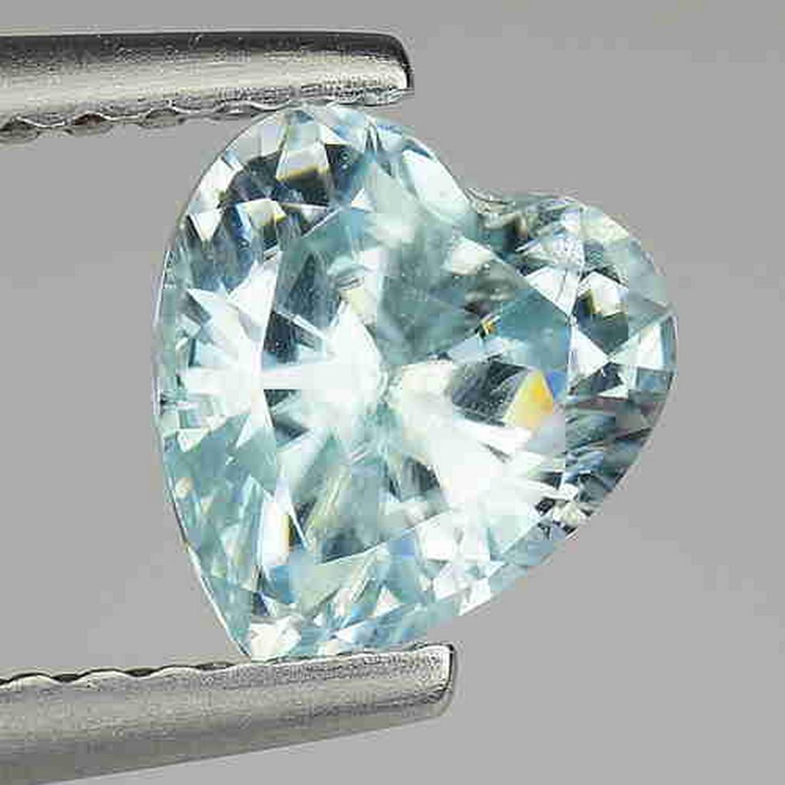 1.40 CTS NATURAL ZIRCON HEART SHAPE GOOD LUSTER LOOSE: Title: 1.40 CTS NATURAL ZIRCON HEART SHAPE GOOD LUSTER LOOSE GEMSTONES Carat Weights: 1.4 Size/Dimensions: 6.4 x 5.9 x 3.8 MM Additional Information: VVS QUALITY Reserve: $25.00 Shipping: Domestic: Fl