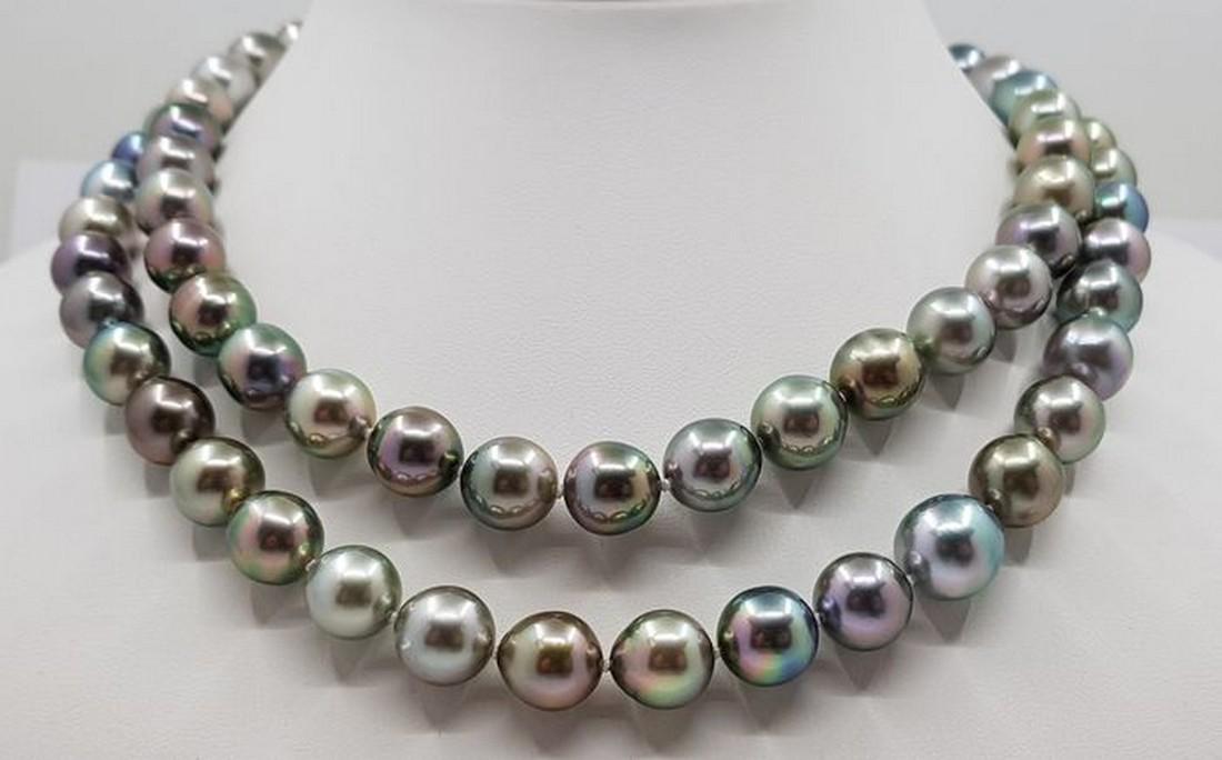 10x12mm Shimmering Multi Tahitian Pearls - Long: Title: 10x12mm Shimmering Multi Tahitian Pearls - Long Necklace Additional Information: Grown in the black-lipped Pinctada margaritifera oyster in the tropical waters of French Polynesia, these Tahiti