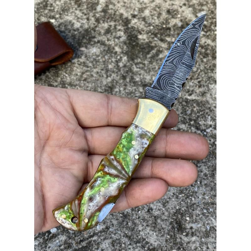 Hiking damascus steel knife resin brass: "Knife ""Judson"" Damascus knives are very durable, look great and keep sharpness perfectly. Damascus steel has high quality contents to give it an excellent edge and sharp cutting ability. The blade 