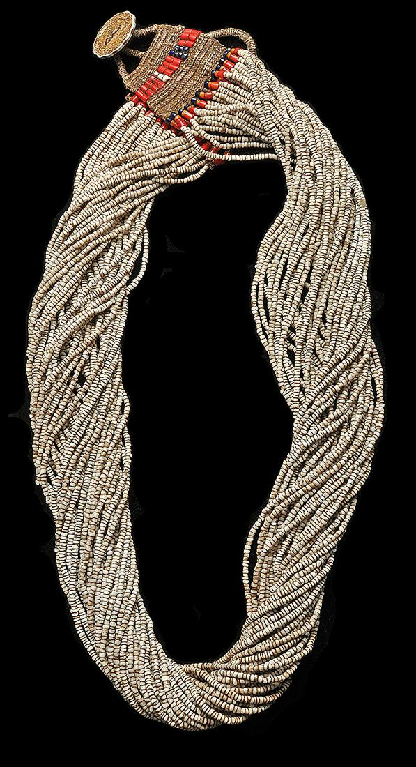 Naga Bead Necklace: Title: Naga Bead Necklace Provenance/Additional Info: Naga bead necklace. Multistrand white bead necklace. The naga are a tribal group concentrated in the border areas of north-eastern india and easte