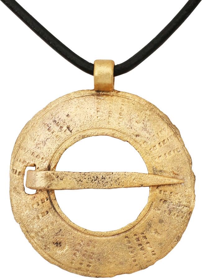 FINE VIKING PROTECTIVE BROOCH PENDANT 10th C.: Circular bronze, 1 1/2" diameter. Circular, slotted for the cross pin. Slightly domed and line bordered with eight radial groups of three stipple lines The surface with light texture from burial. Prof