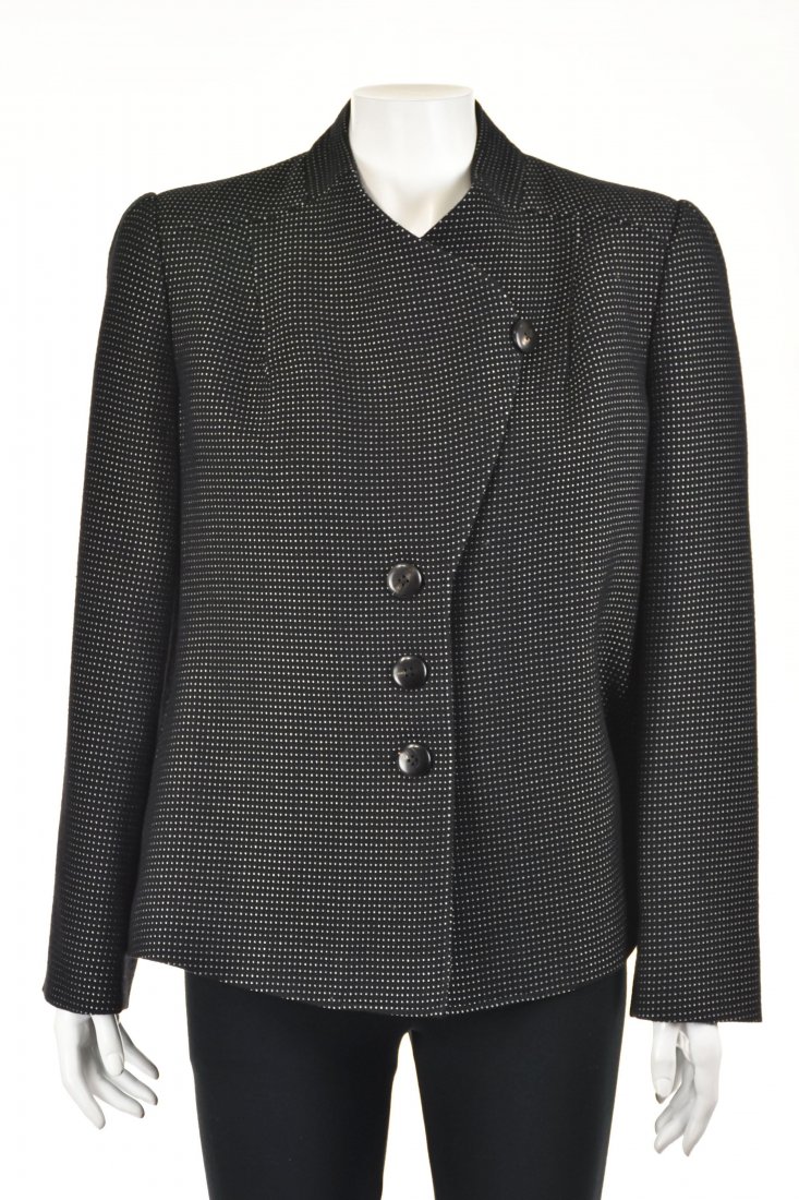 GIORGIO ARMANI Black & White Asymmetrical Jacket: Versatile black jacket from Giorgio Armani's "Collezioni" label features an asymmetrical closure at the neckline. Year-round fabric is a black wool and acetate blend with a small white dot pattern. Fu