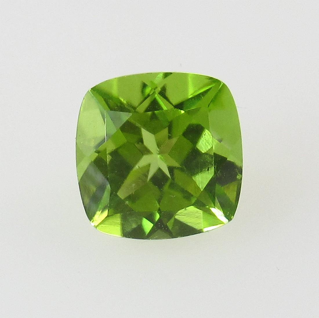 1.69 Ct Natural Pakistan Peridot Cushion Cut: No Reserve! Title: 1.69 Ct Natural Pakistan Peridot Cushion Cut Stone Clarity: VVS Gemstones: Natural Peridot Carat Weights: 1.69 Size/Dimensions: 7.00 x 7.00 x 4.80 mm Additional Information: Top Cla