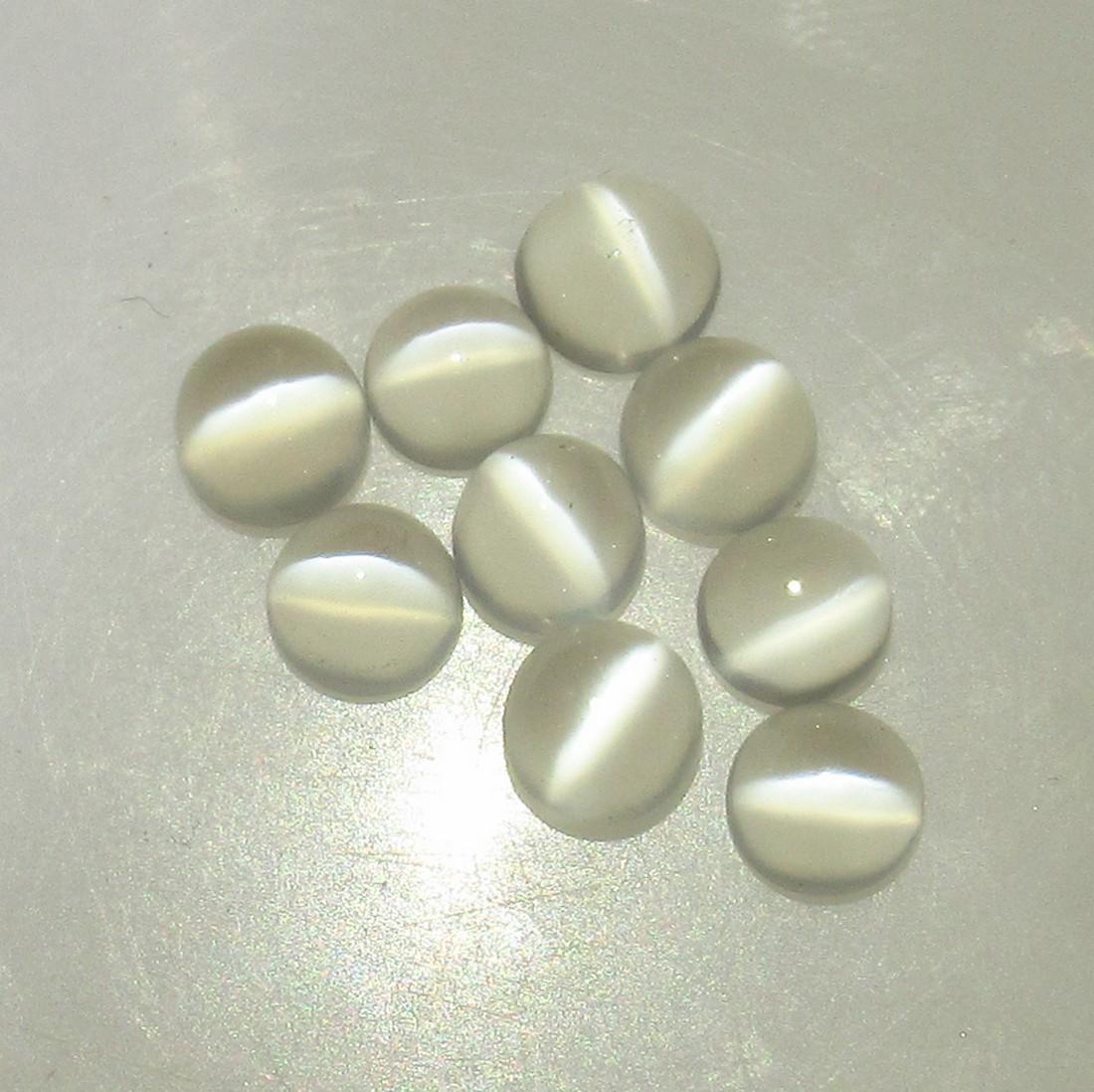 5.91 Ctw Natural 9 Moonstone Round Set: No Reserve! Title: 5.91 Ctw Natural 9 Moonstone Round Set Stone Clarity: Transparent Gemstones: Moonstone Size/Dimensions: 5.91 Carat Weights: 5.00 - 5.20 mm / 9 PC's Additional Information: Nice Roun