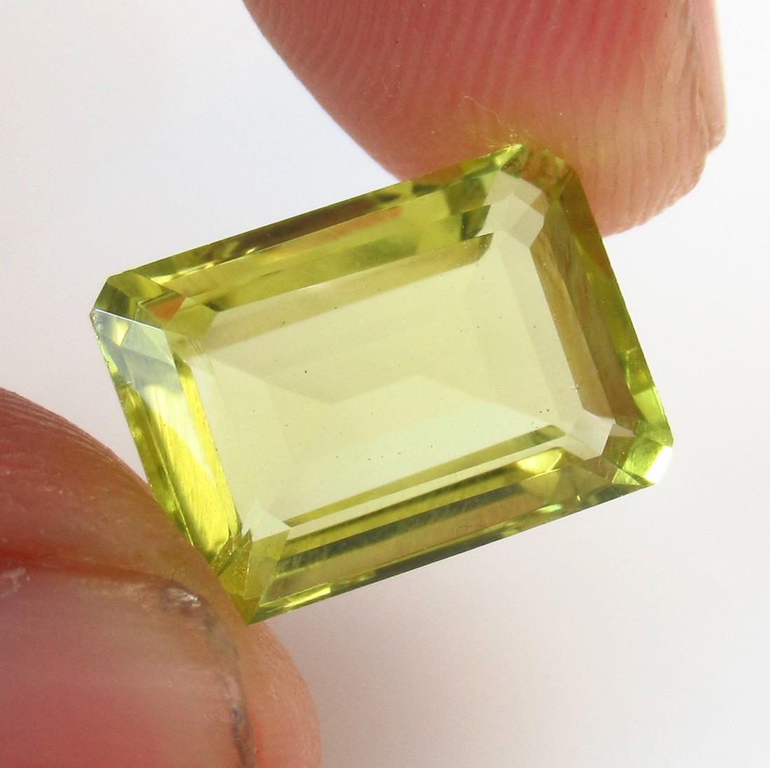 6.94 Ctw Natural Lemon Quartz Octagon Cut: No Reserve! Title: 6.94 Ctw Natural Lemon Quartz Octagon Cut Stone Clarity: VVS Gemstones: Lemon Quartz Size/Dimensions: 6.94 Carat Weights: 13.80 x 10.00 x 6.40 mm Additional Information: Good Luster