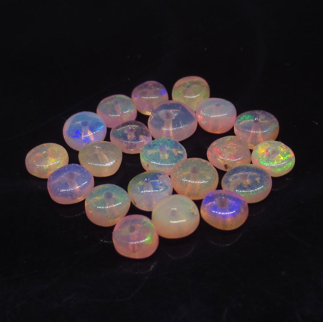 3.30 Ctw Natural 21 Drilled Pink Fire Opal Beads: No Reserve! 3.30 Ctw Natural 21 Drilled Pink Fire Opal Beads Shipping: Domestic: Flat-rate of $7.00 to anywhere within the contiguous U.S. International: Foreign shipping rates are determined by desti