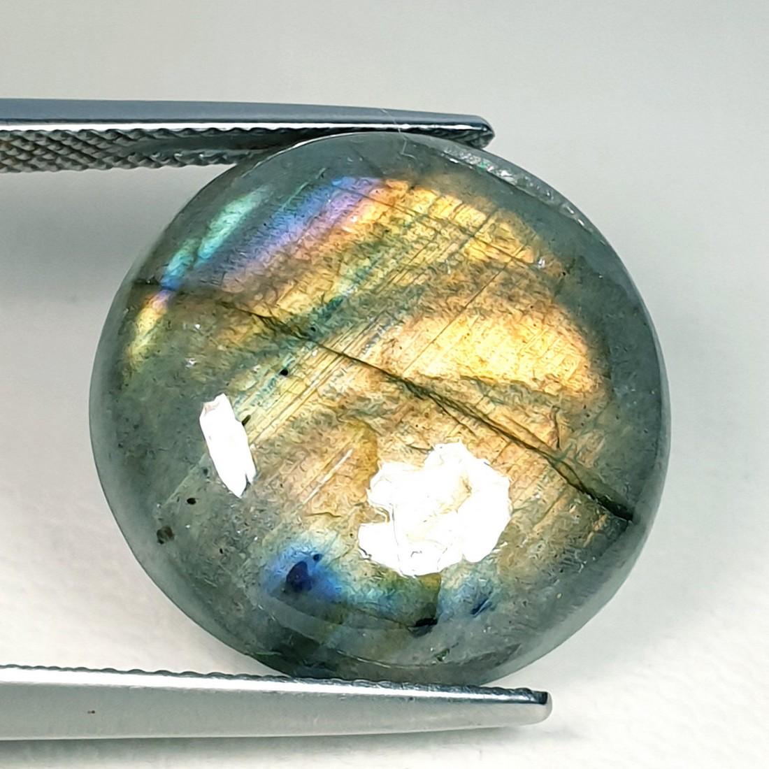 19.49 ct Natural Labradorite: No Reserve! Title: 19.49 ct Natural Labradorite Color/Clarity: Opaque Gemstones: Gemstones Carat Weights: 19.49 Size/Dimensions: 19.50 x 19.50 x 6.20 Additional Information: Round - USA Shipping: Dom