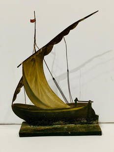 c. 1890 Tin Sailboat: Title: c. 1890 Tin Sailboat Date/Period: c. 1890 Dimension: 8" x 11” Additional Information: Dramatic silhouette, exquisitely dimensional paint. Sailor at the tiller. Bold, graphic imagery. Shipping